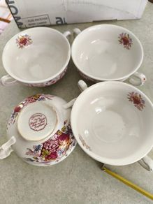 SET OF 4 SOUP BOWLS  the Staffordshire Potteries in Stoke-on-Trent, England. The text "Flowers Made by Royal Tudor Stoke-on-Trent England