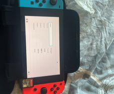 nintendo switch 1 with legends of Zelda breath of the wild and doc