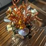 Small orange and tan fake flowers Image 4