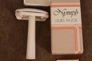 ladies vintage nymph razor with two razor blades in original packaging circa 1960's in excellent condition with no issues FREE STANDARD POSTAGE INCLUDED