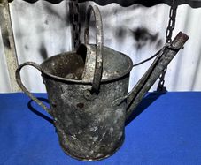 Vintage galvanised watering can