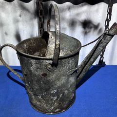 Vintage galvanised watering can