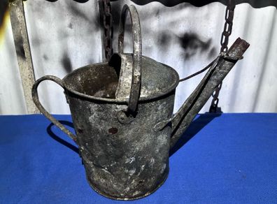 Vintage galvanised watering can