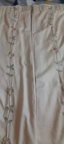A pair of vintage embroidered curtains