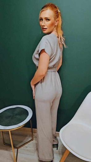 Jumpsuit with a decorative belt and tied back