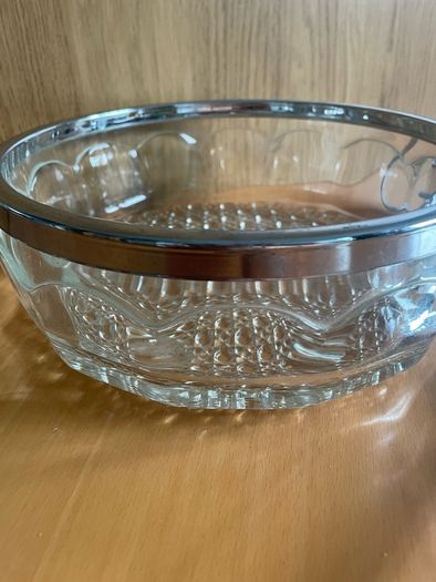 Vintage Silver Plate Rim Pressed Glass Bowl with silver-plated condiment set and matching spoons.