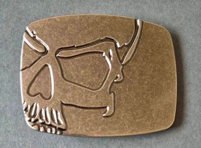 Belt buckle, skull design.