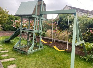 Tree house / play frame / slide / swings / climbing