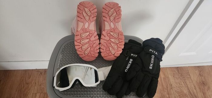 ski boots glasses and gloves