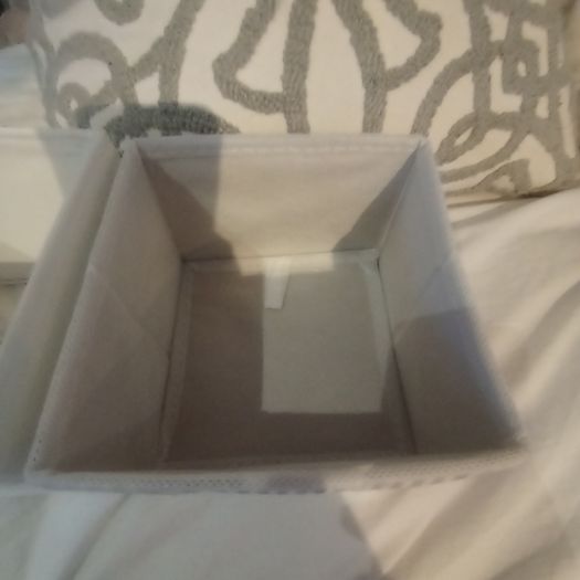 2 small foldable storage boxes