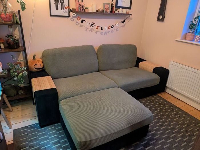 Green 3 seater sofa with matching footrest