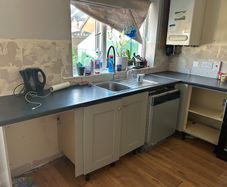 Noyeks black laminate countertop and sink