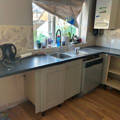 Noyeks black laminate countertop and sink