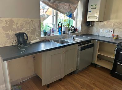 Noyeks black laminate countertop and sink