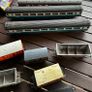 Some random parts for hornby trains. Included is 2 British rail coaches in need of repair. A Harry Potter coach. Also various goods trucks Image 4