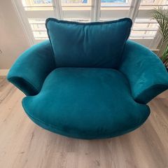 Teal love seat swivel.