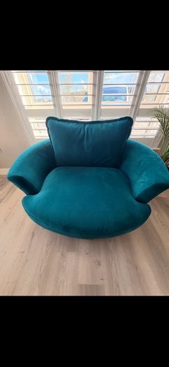Teal love seat swivel.