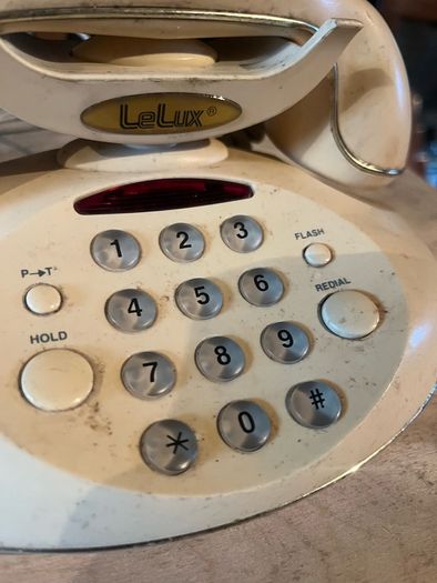 2 retro house phones . One lead missing. Easy to purchase.