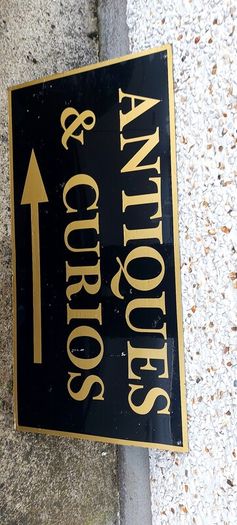 Antiques & Curios,hard plastic sign perspex. ,unusual and lovely colours,,32 inches length, 16 inches height,,buyer collects, see pictures for condition, used condition few marks nicks