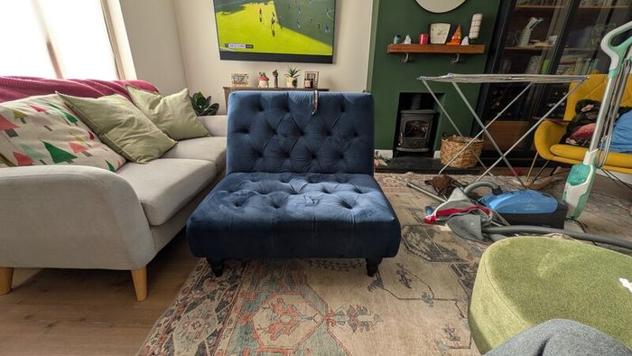Navy footstool/ottoman from Next. Good condition. Material has rip so needs repair or reupholstery.