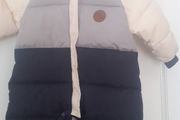 New boys snowsuit with fleece lined hood and body .Navy and Cream .No tags but never worn as ordered the wrong size .Size 12 -18 months .12 euro