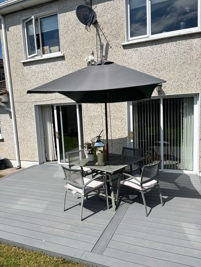 Patio table with Parasol and 4 chairs