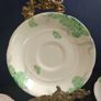 Lovely Set of Six Vintage English Bone China Hand Painted Saucers, (For Use as Petit Fours Plates), with Green Flowers on a Creamy Yellow Base Glaze. Image 3