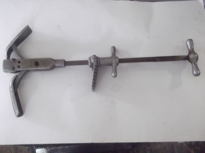 a antique steel adjustable shue stretcher