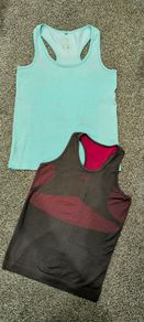 Two sport tops, best fit size 14
