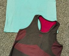 Two sport tops, best fit size 14