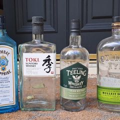 SIX FREE but empty liquor bottles