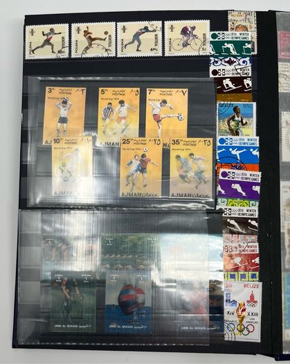 Ace Black 32 page/ 16 leaf Stamp Album with over 900 stamps. Thematic of Animals, Plants, Classic Cars, Space, Trains, Sport & Disney noted.