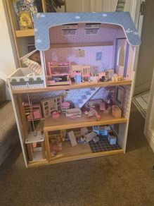 dolls house with accessories