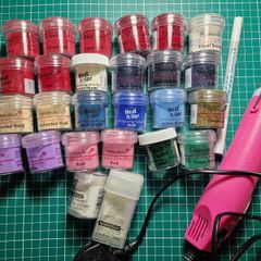 Embossing powders with heat gun