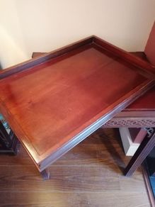 Elegant carved wooden dumb waiter table