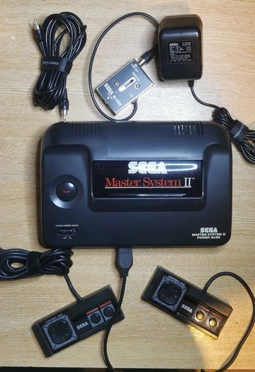Rare Boxed. MINT Condition. Sega Master System II with Sonic Build In Game.