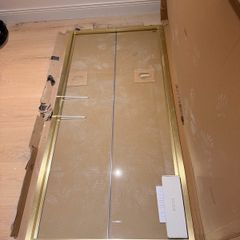 Brushed brass bifold shower door (1m)