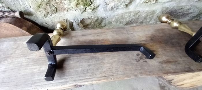 Antique Fire dogs and 4 piece fire set solid brass tops and steel