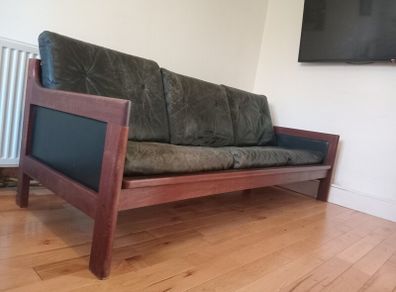 mid century teak and black leather sofa