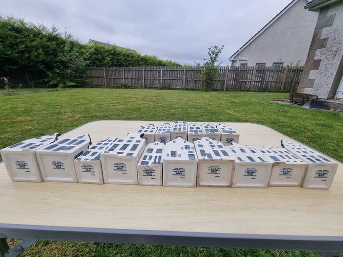 Collection of 16 porcelain miniature houses KLM