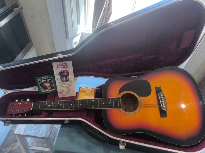 Acoustic guitar and Hiscox hard case