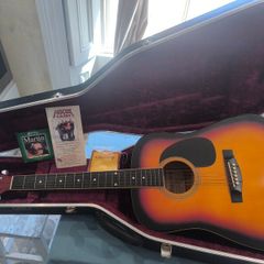 Acoustic guitar and Hiscox hard case