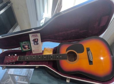 Acoustic guitar and Hiscox hard case