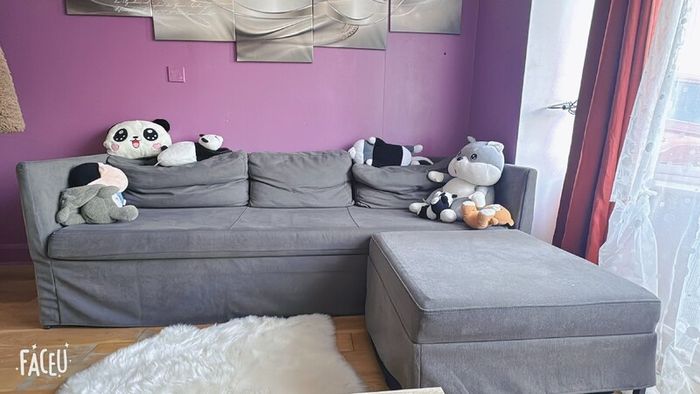Grey fabric sofa with matching footstool