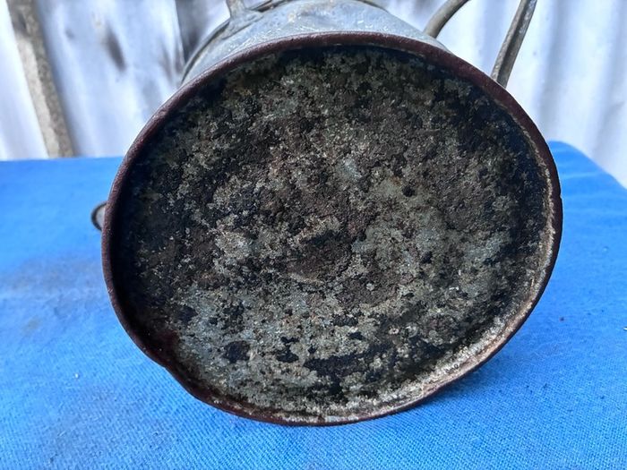 Vintage galvanised watering can