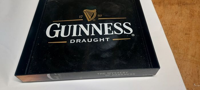 Guinness square drinks tray ,unusual item square ,buyer collects or pays postage, see pictures for condition ,used condition few marks, good solid condition,,sold as is .