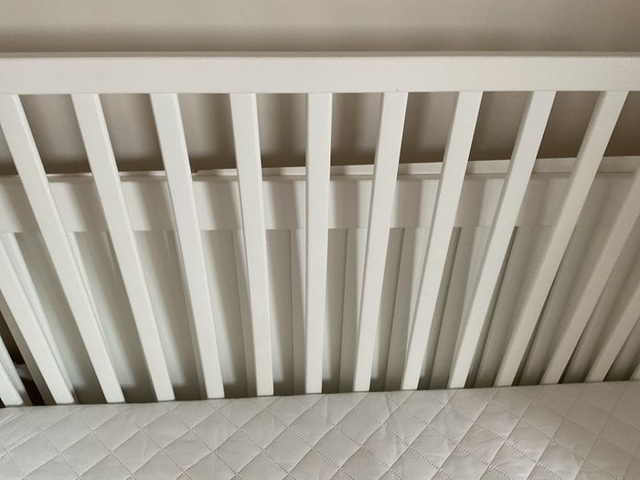 ikea cot bed white , one long drawer ideal for books