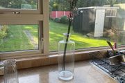 Glass vase and artificial flowers