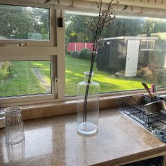 Glass vase and artificial flowers