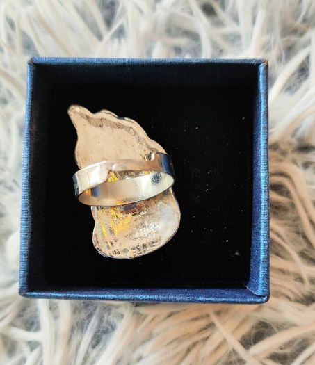 Unique design ring with a red angel wing stone